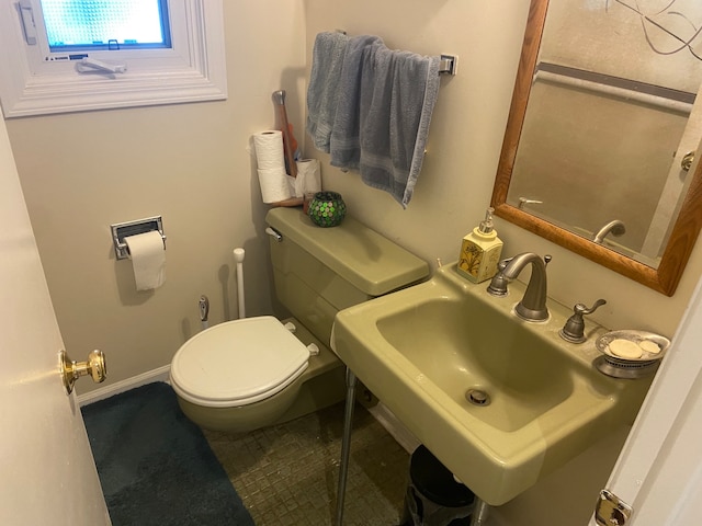 bathroom with toilet and sink