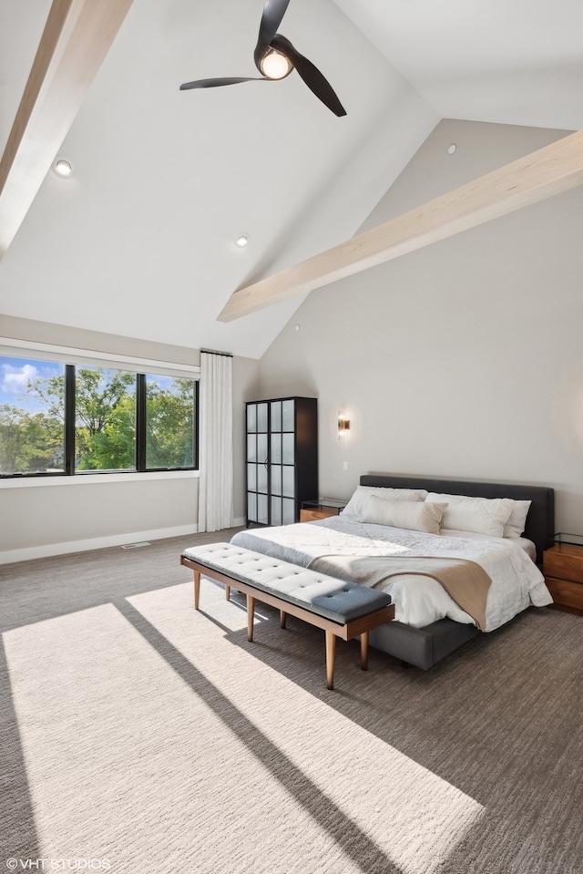 carpeted bedroom with ceiling fan and lofted ceiling