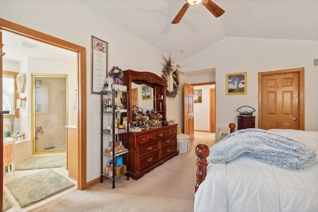 bedroom with ensuite bathroom, light carpet, ceiling fan, and vaulted ceiling