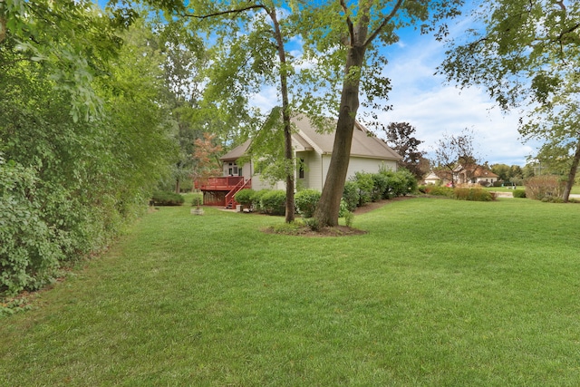 view of yard featuring a deck