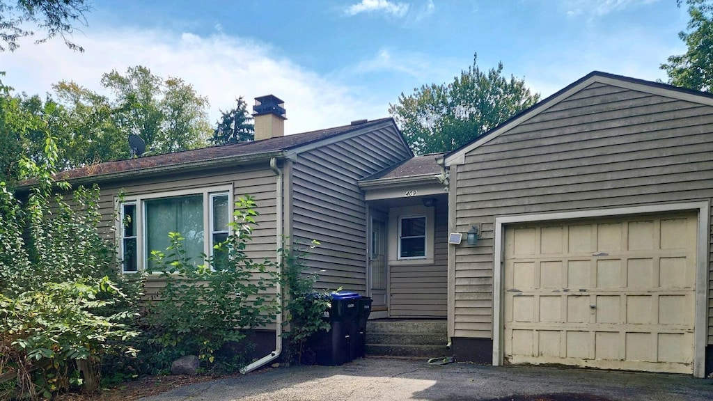 view of front of home with a garage