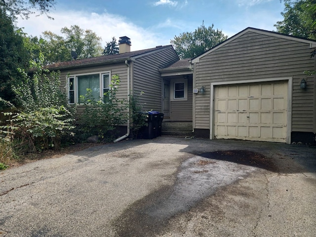 single story home with a garage