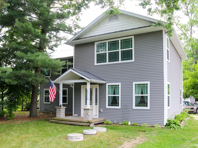 view of front of home with a front yard