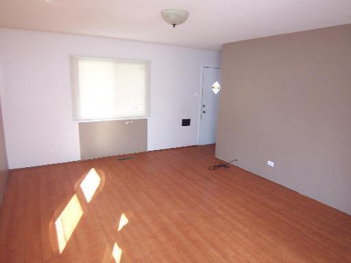 unfurnished room featuring hardwood / wood-style floors