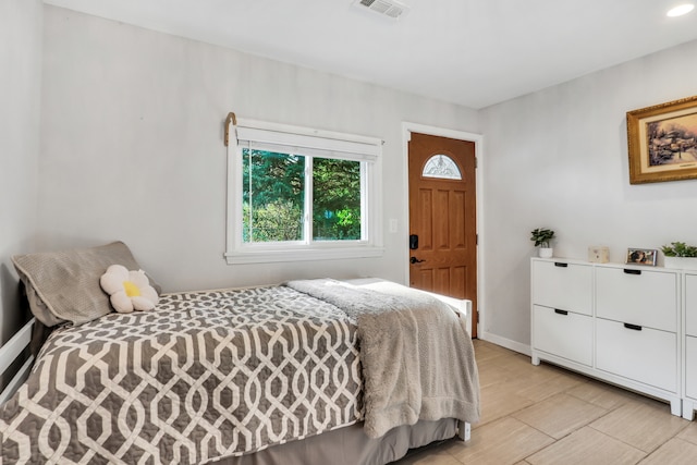 bedroom featuring light hardwood / wood-style flooring