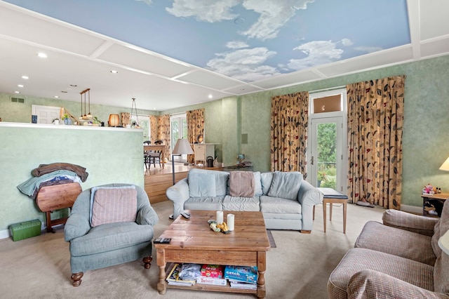 carpeted living room with a wealth of natural light