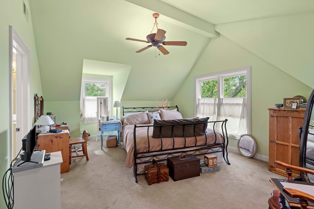 carpeted bedroom featuring vaulted ceiling with beams, multiple windows, and ceiling fan