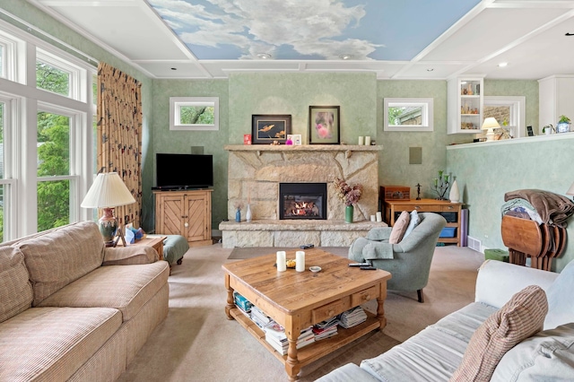 carpeted living room featuring a fireplace