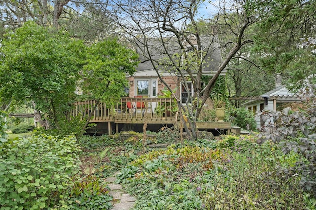 rear view of property with a deck