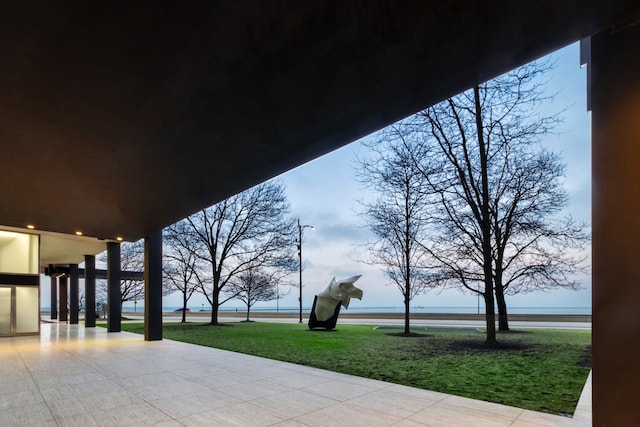 view of patio featuring a water view