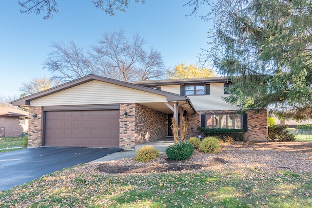 view of front of property with a garage