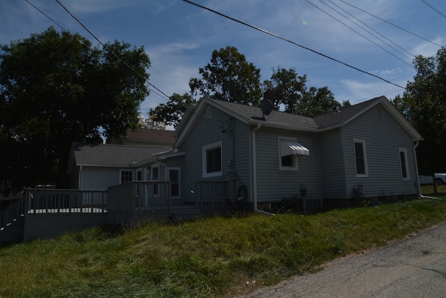 view of home's exterior featuring a lawn