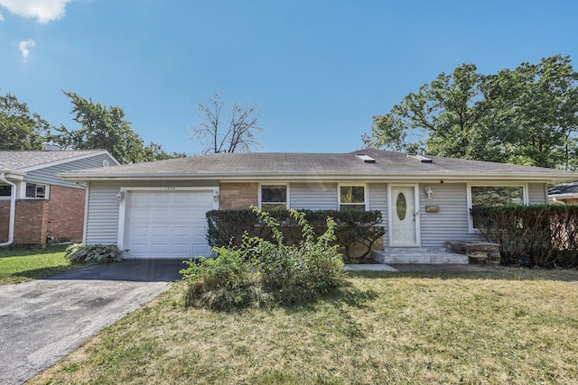 ranch-style house with a front lawn and a garage