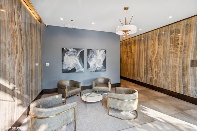 community lobby with recessed lighting and a surveillance system