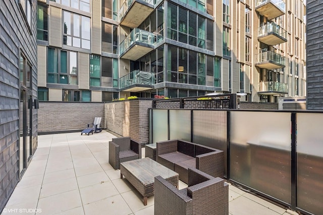 balcony featuring a patio area