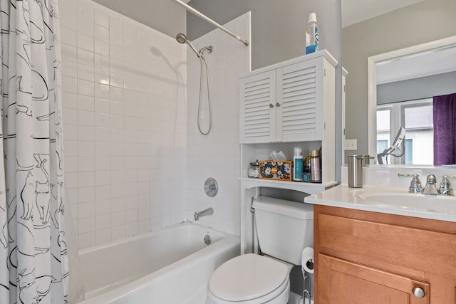 full bathroom featuring shower / bath combo with shower curtain, vanity, and toilet