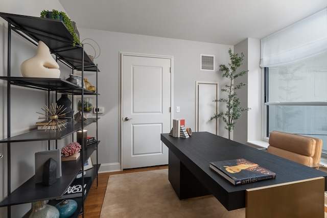 home office featuring hardwood / wood-style floors