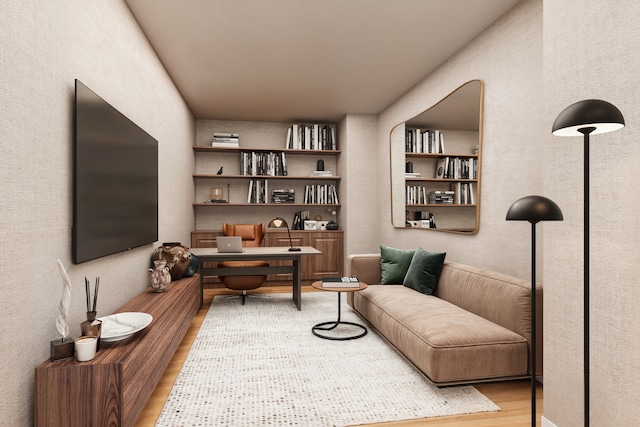 sitting room featuring light wood-type flooring