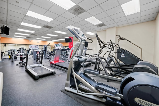 workout area featuring a drop ceiling