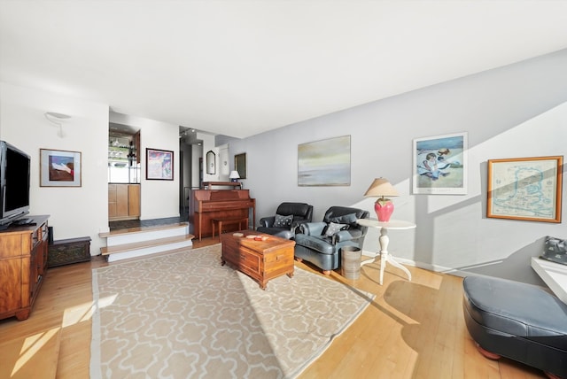 living room with light hardwood / wood-style flooring