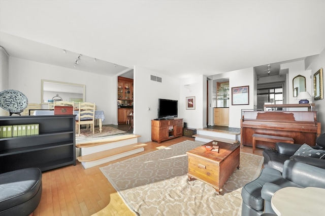 living room with hardwood / wood-style flooring