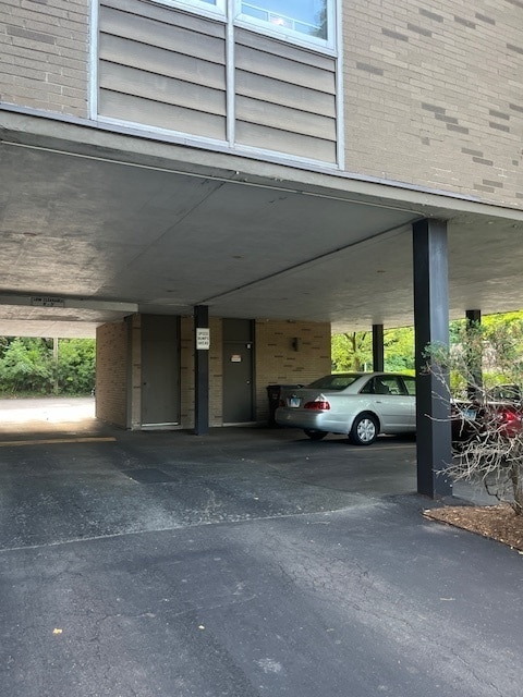 exterior space featuring a carport