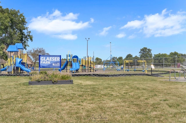 view of jungle gym featuring a yard