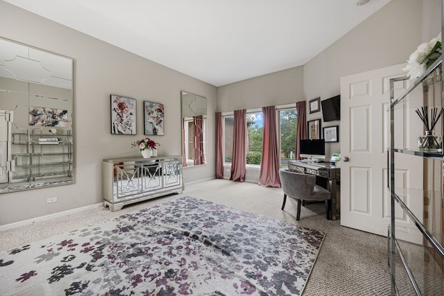 home office with carpet flooring and lofted ceiling