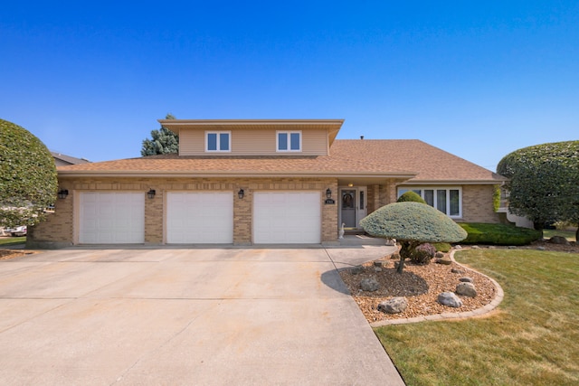 front of property with a garage