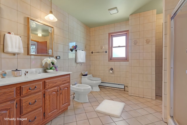 bathroom featuring an enclosed shower, toilet, tile walls, baseboard heating, and a bidet