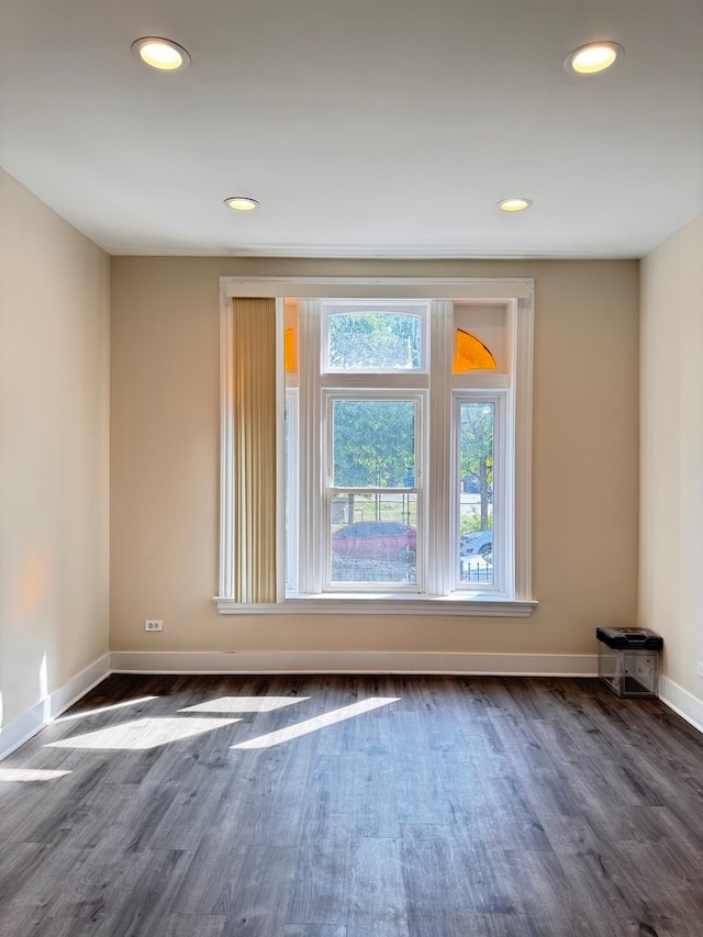 unfurnished room with a barn door