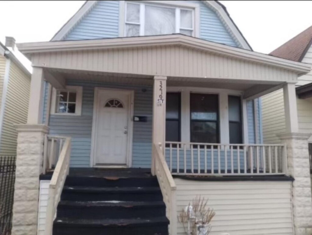 3219 W 64th St, Chicago, IL 60629 - bungalow-style home with covered porch