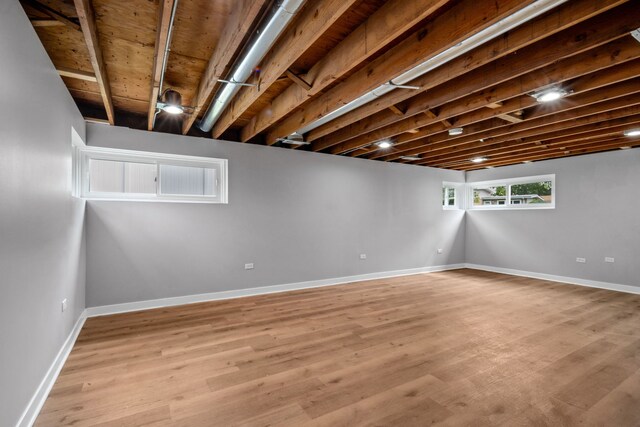 basement with light wood-type flooring