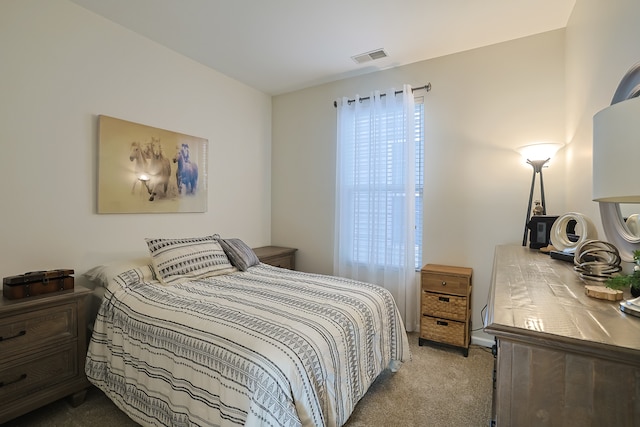 bedroom with light carpet