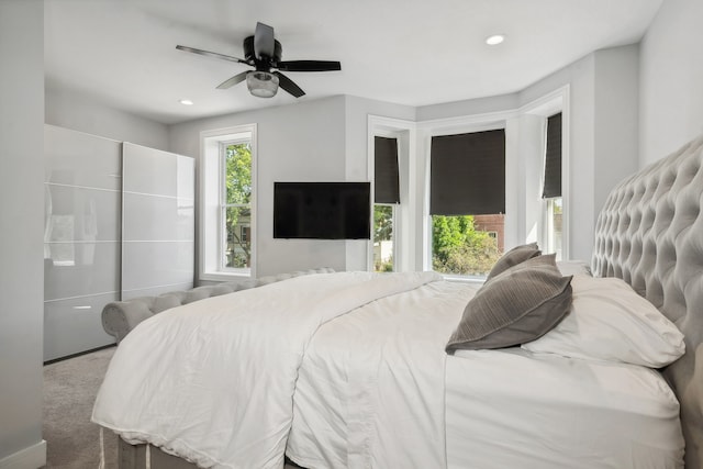 bedroom featuring carpet floors, a ceiling fan, and recessed lighting