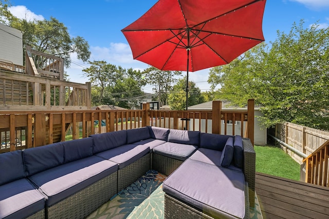 wooden deck featuring outdoor lounge area