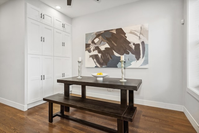 interior space with dark wood-style floors, recessed lighting, and baseboards