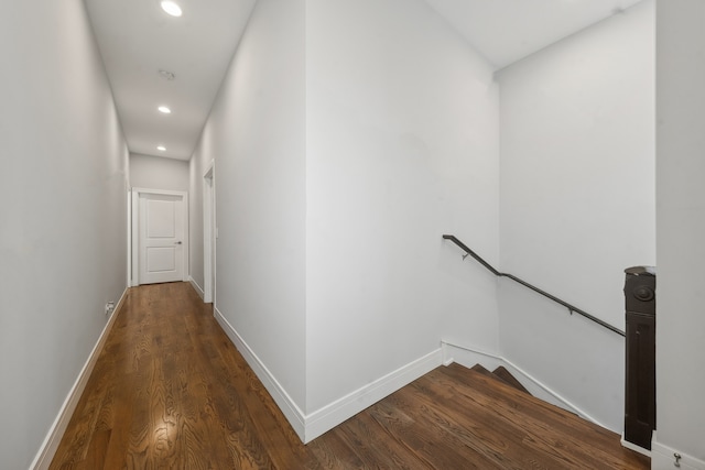 hallway featuring dark hardwood / wood-style floors