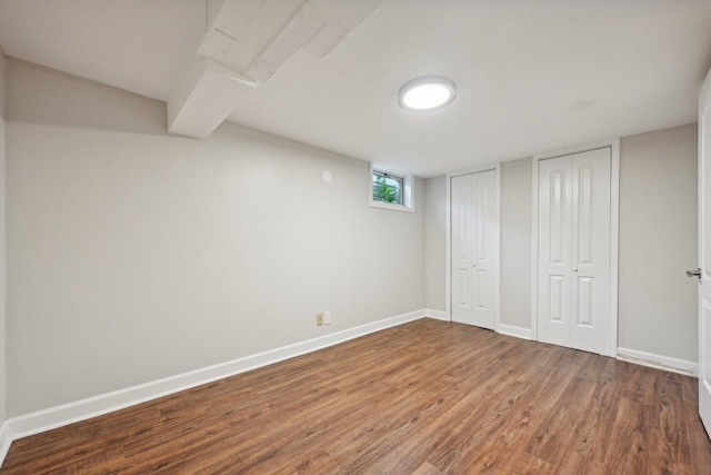 basement featuring wood-type flooring