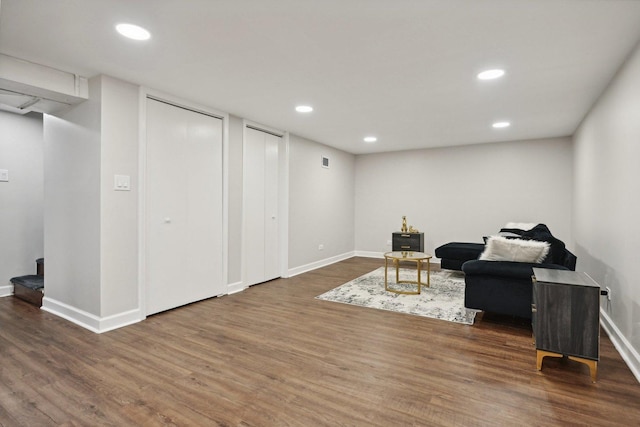 sitting room with dark hardwood / wood-style floors