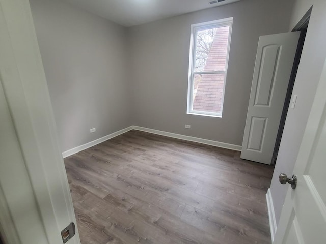 empty room with light wood-type flooring