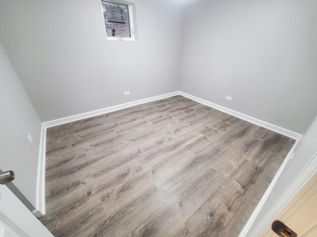 unfurnished bedroom with a closet and light hardwood / wood-style flooring