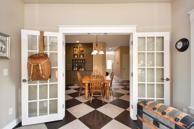 dining space with a notable chandelier