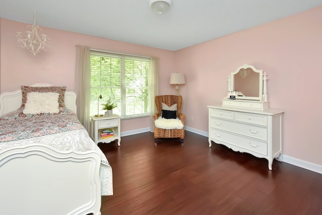 bedroom featuring dark wood-type flooring