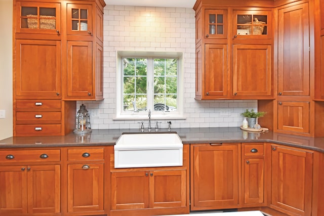 kitchen with sink and tasteful backsplash