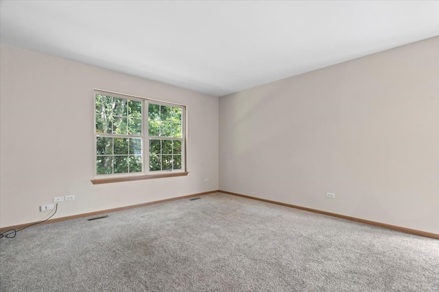 view of carpeted spare room