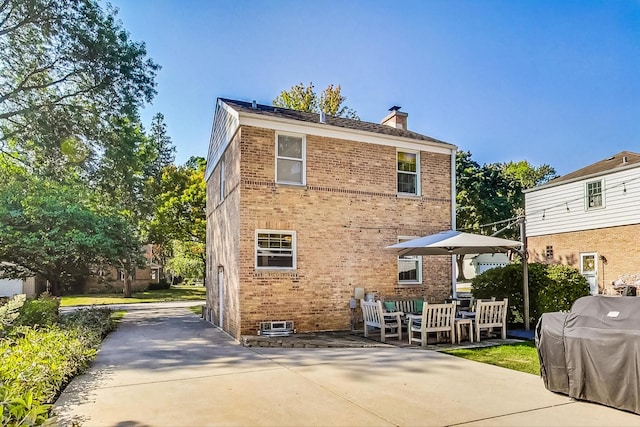 back of house featuring a patio