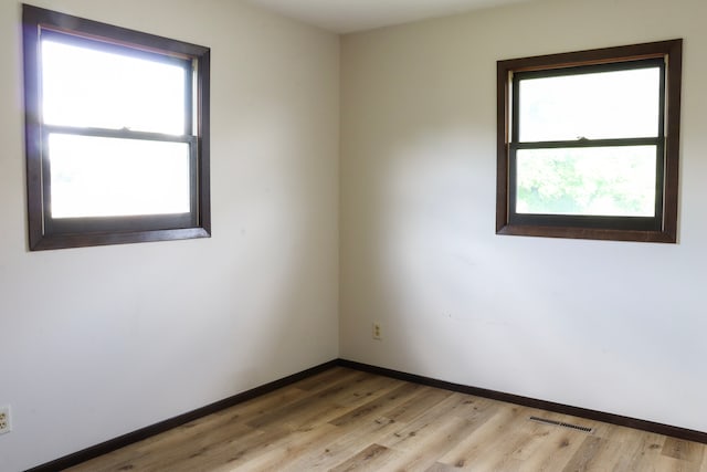 empty room featuring light hardwood / wood-style floors