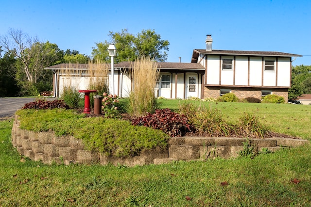 view of front of home with a front yard