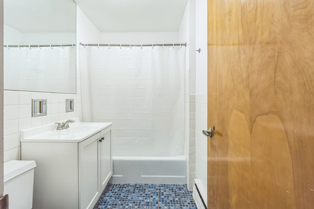 full bathroom with decorative backsplash, shower / bath combo with shower curtain, vanity, tile patterned flooring, and toilet